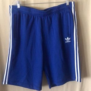 white adidas shorts with blue stripes